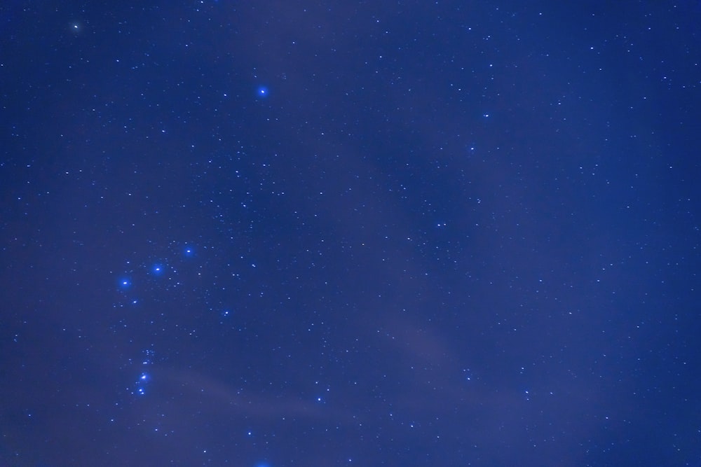 blue sky with stars during night time