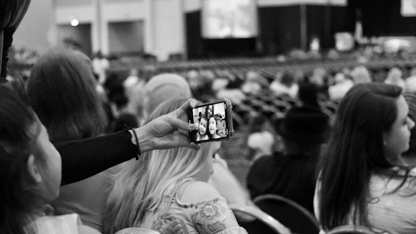 The 360-degree selfie booth with guests having fun taking creative selfies.