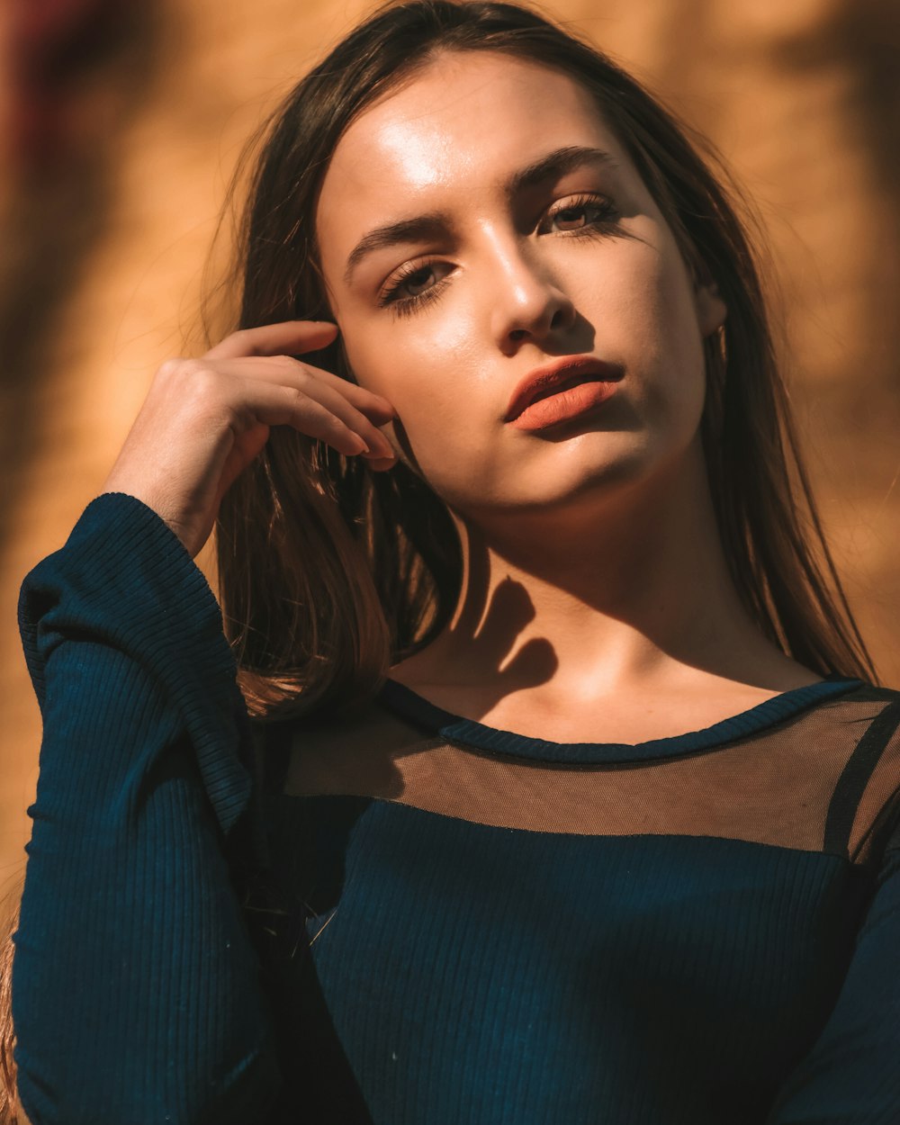 woman in blue and black striped scoop neck shirt