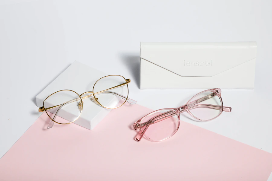 Gold-framed eyeglasses on white paper