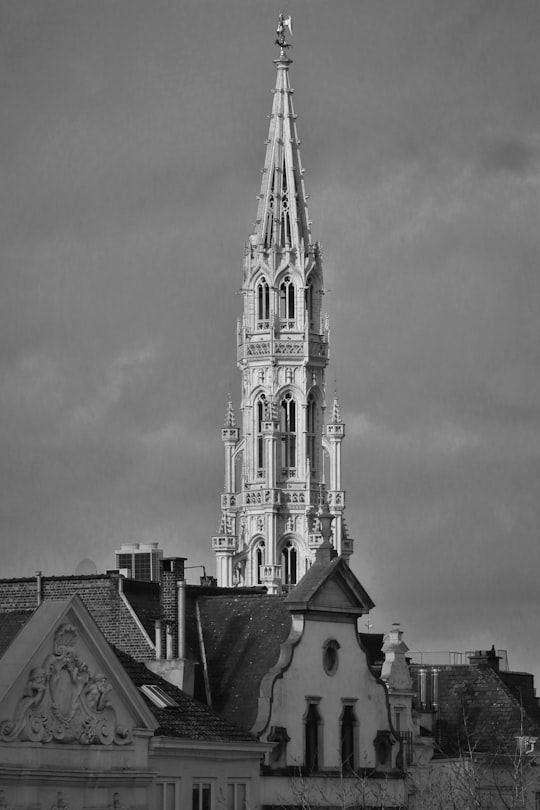 grayscale photo of concrete building in Grand Place, Brussels Town Hall Belgium