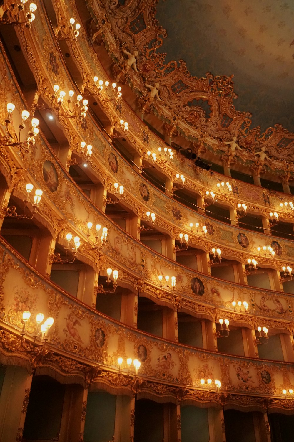 gold and silver chandelier on ceiling