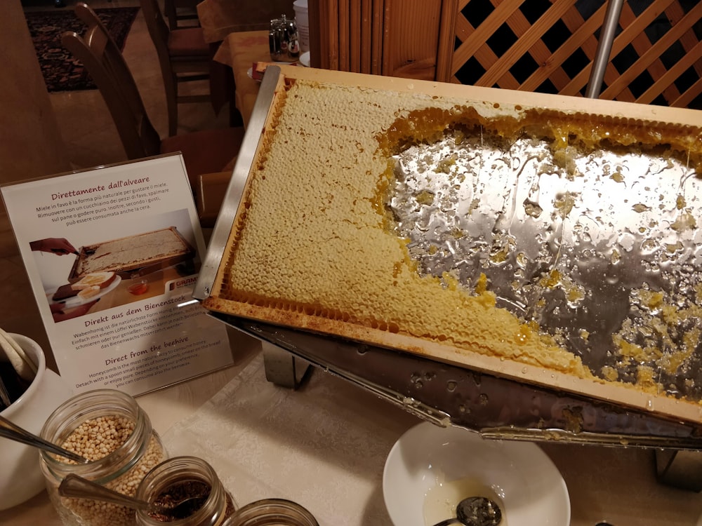 brown and white cake on white ceramic plate