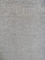 A textured surface with a woven or mesh-like pattern, displaying a uniform structure, likely resembling fabric or a close-up of a textile material.