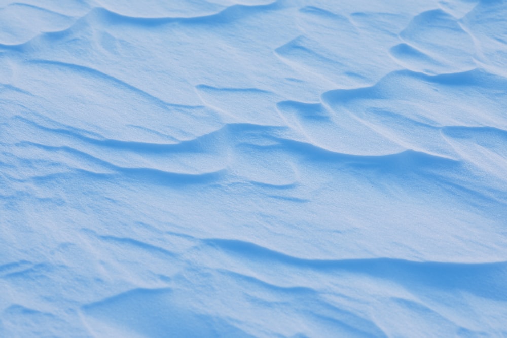 blue and white sand during daytime