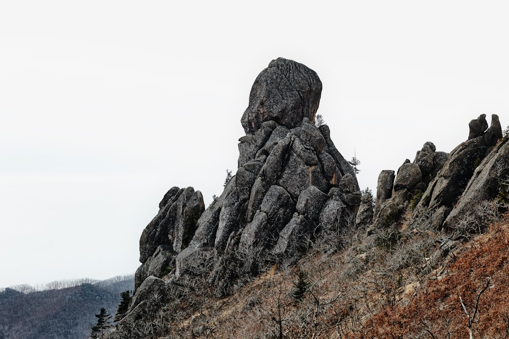 brown rocky mountain under white sky during daytime