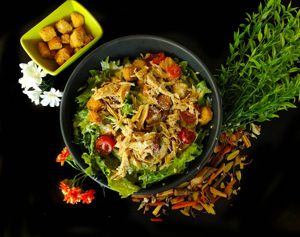 vegetable salad on black ceramic plate