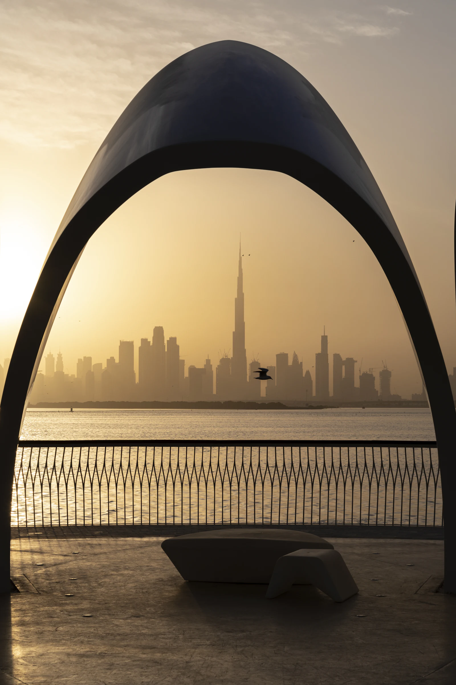 Silhouette of city towers at sunset