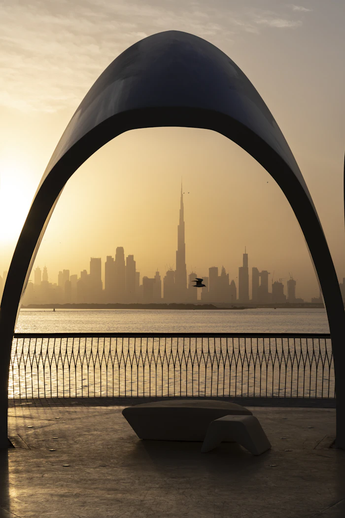 Silhouette of Dubai towers at sunset