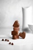 brown wooden heart shaped figurine