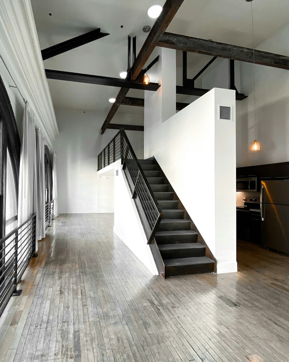 white and brown wooden staircase