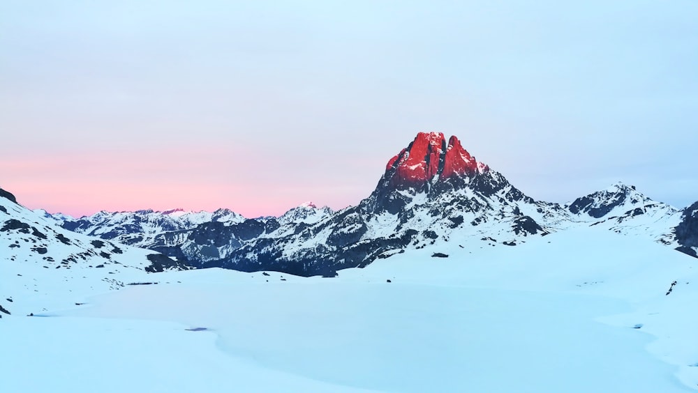 snow covered mountain during daytime