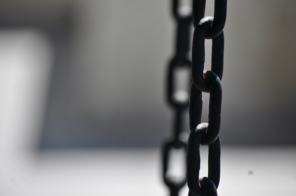 brown metal chain in close up photography