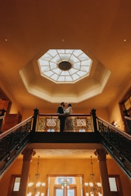 Elegant couple’s suite with balcony and tasteful Hindu-inspired decor.