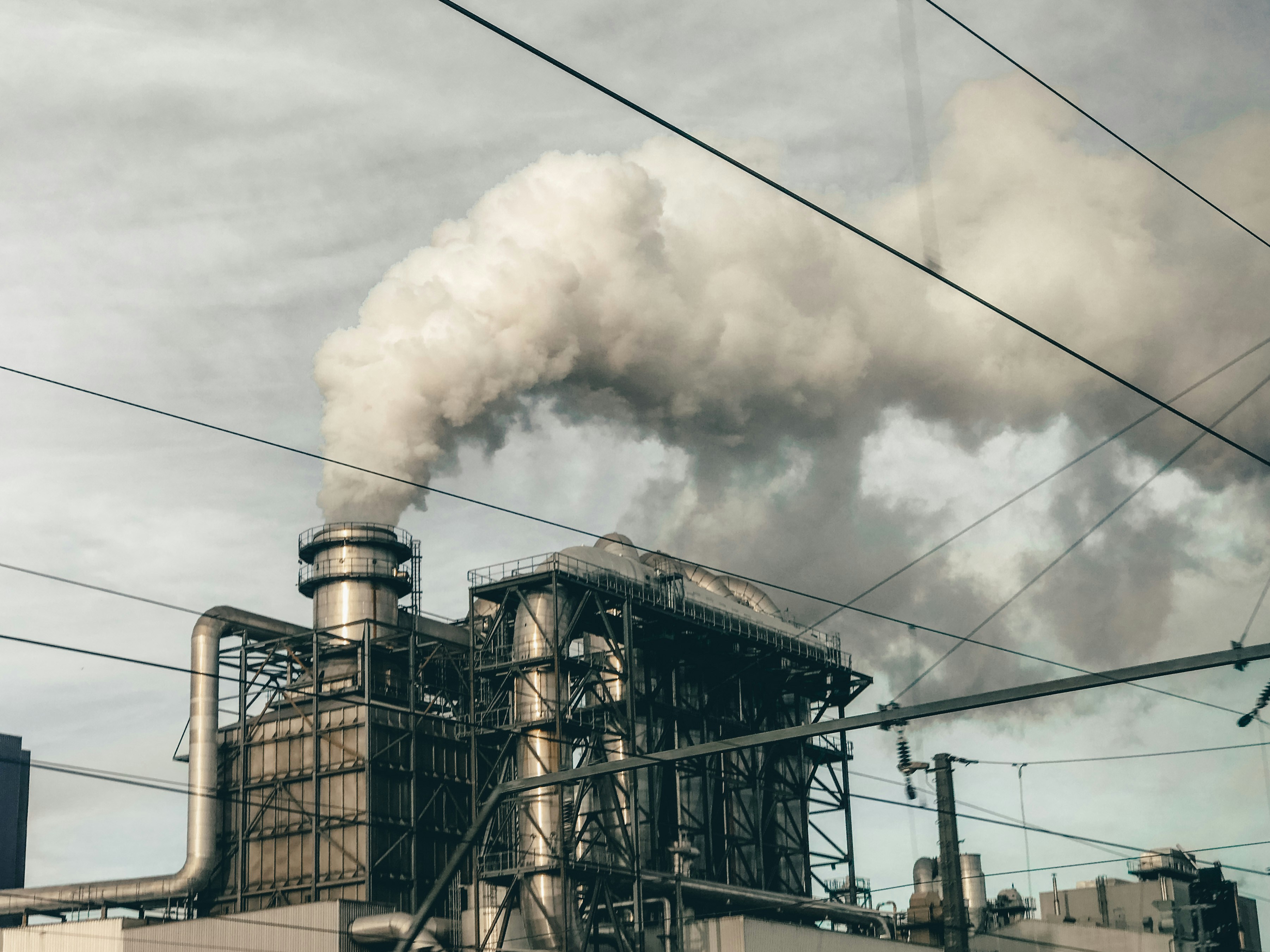 black and white smoke on train rail