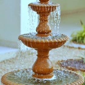 brown and white outdoor fountain