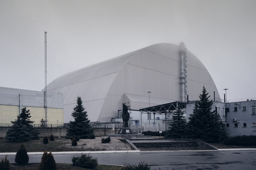 white dome building near green trees during daytime