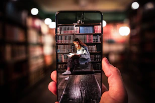 person holding black iphone 5