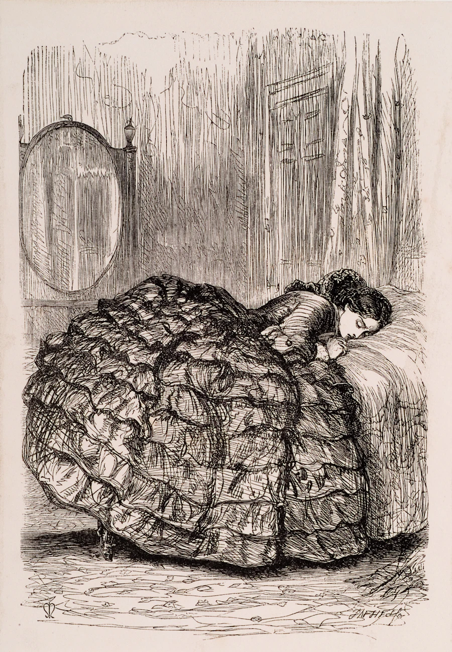 A quiet studio interior with paintings resting against the wall