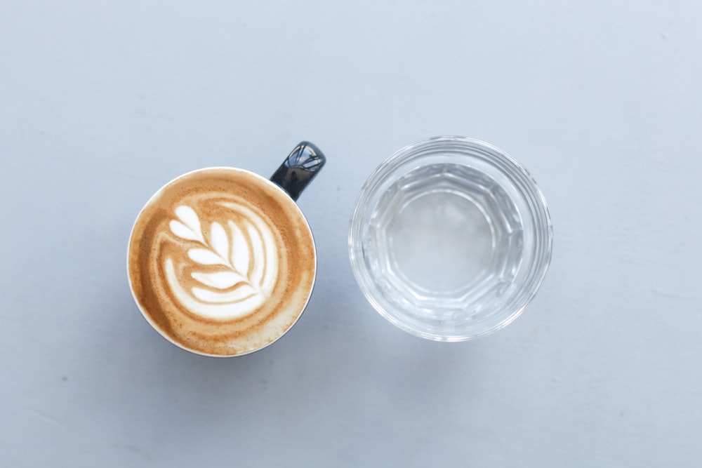 cappuccino in clear glass cup