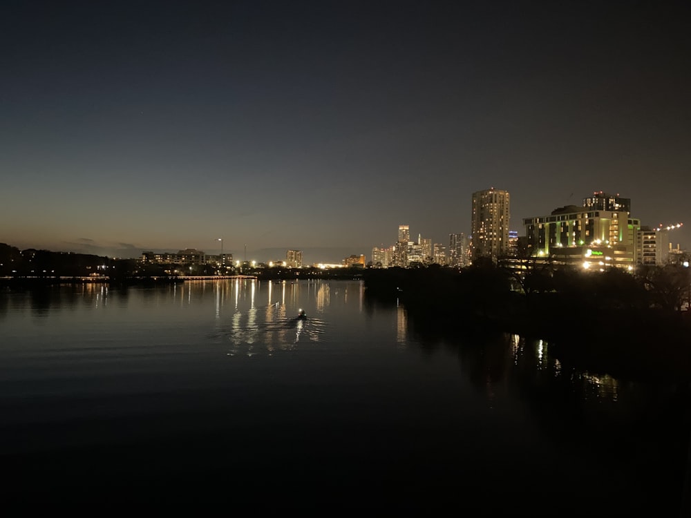 city skyline during night time