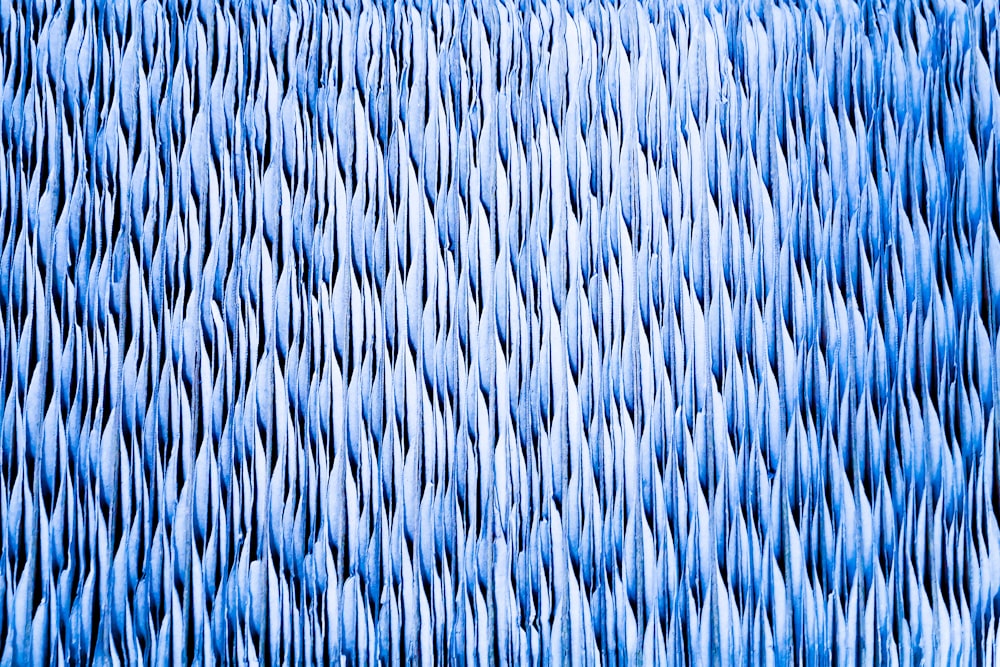 blue and white woven textile