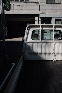 A reliable cargo truck on a city street during daytime.