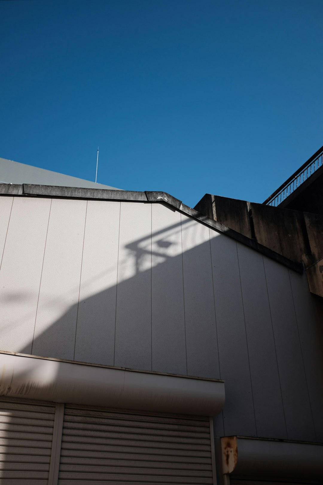 white and gray building under blue sky during daytime