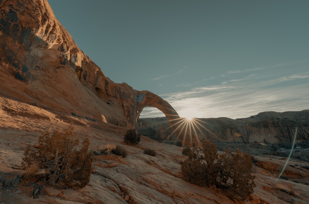 brown rock formation under blue sky during daytime