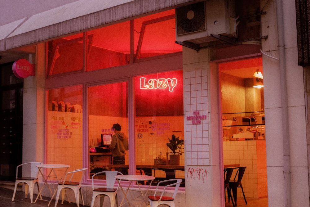 people sitting on chairs inside restaurant