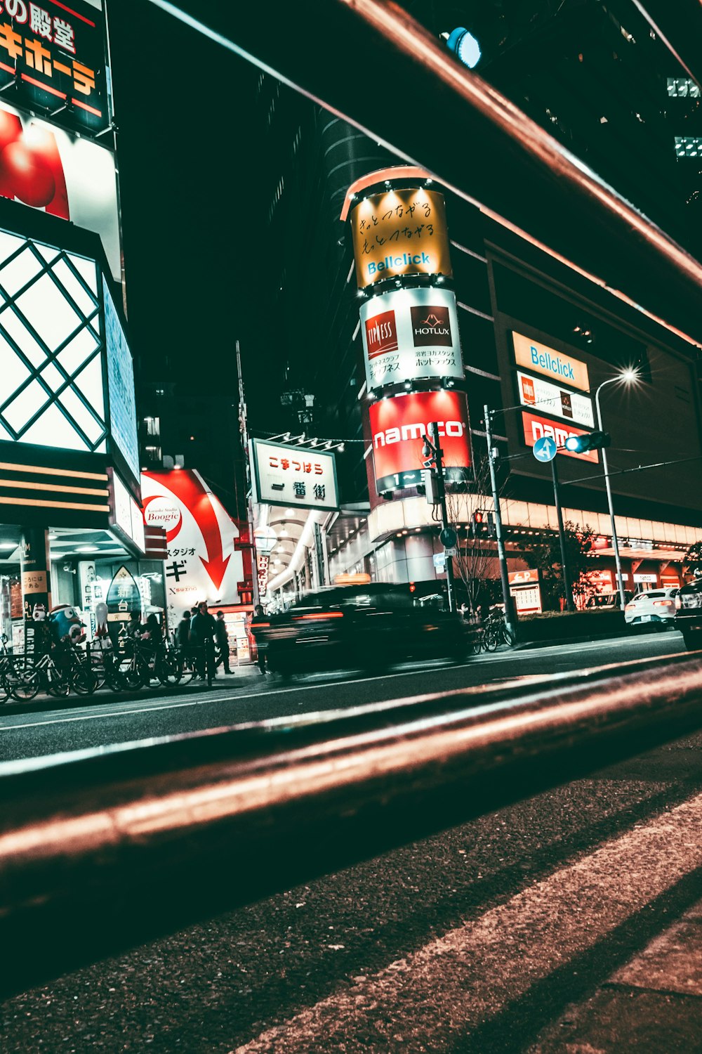 people walking on street during night time