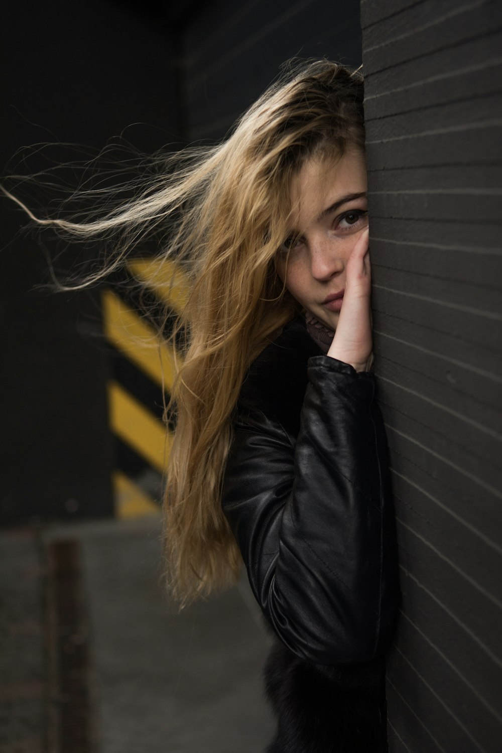 woman in black leather jacket