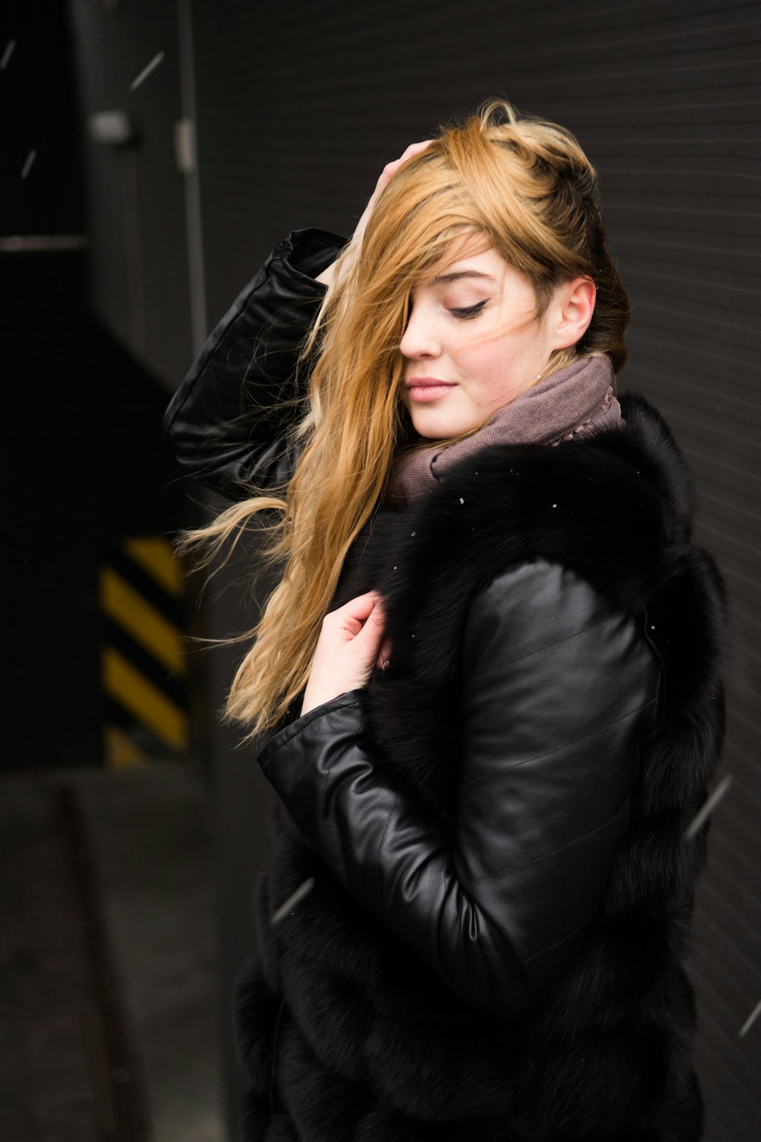 woman in black leather jacket