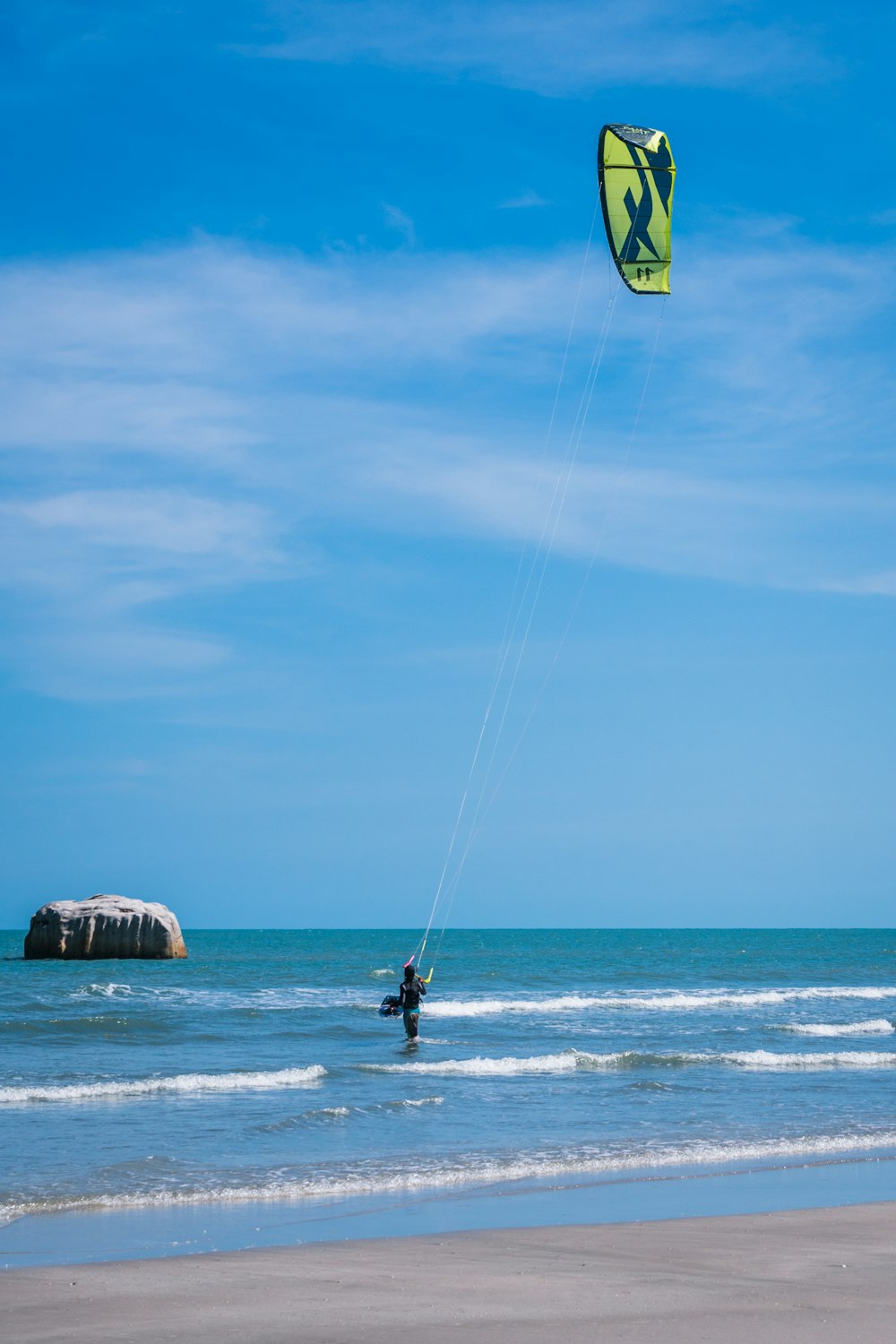 person surfing on sea during daytime