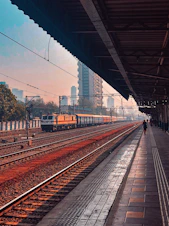 train on rail track during daytime
