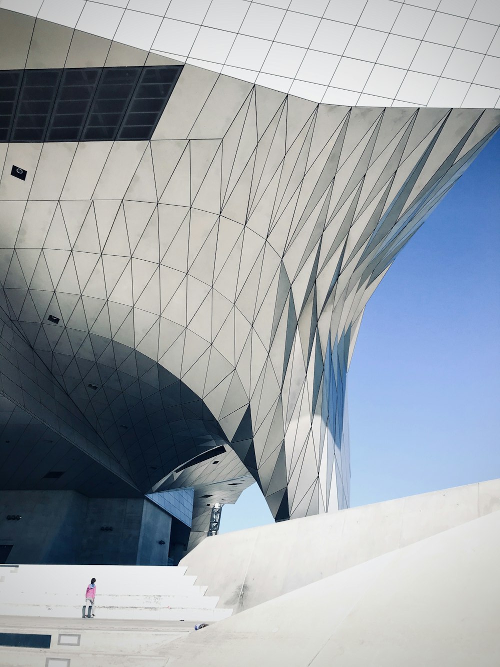 white concrete building under blue sky during daytime