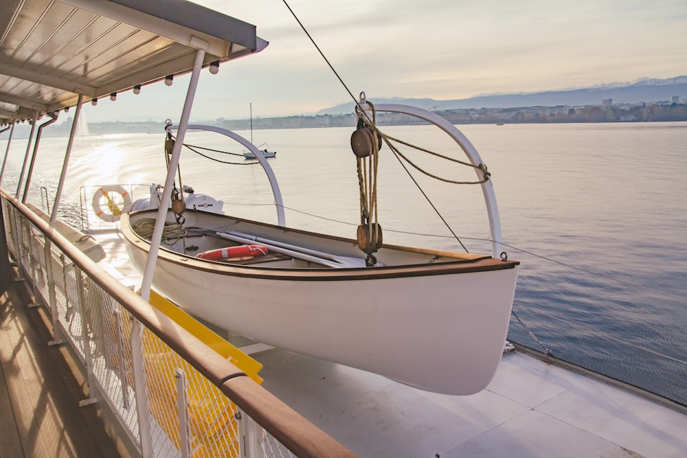 white and brown boat on sea during daytime