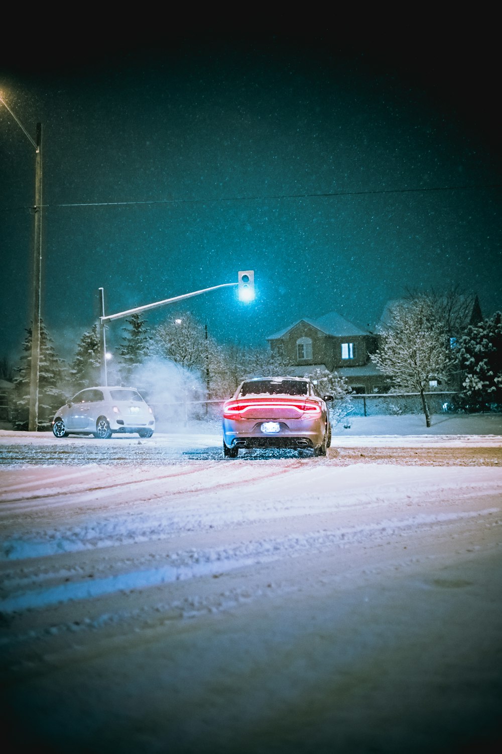 red car on road during daytime