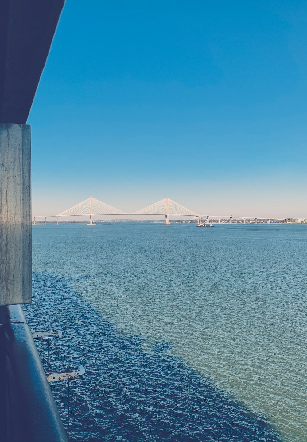 bridge over body of water during daytime