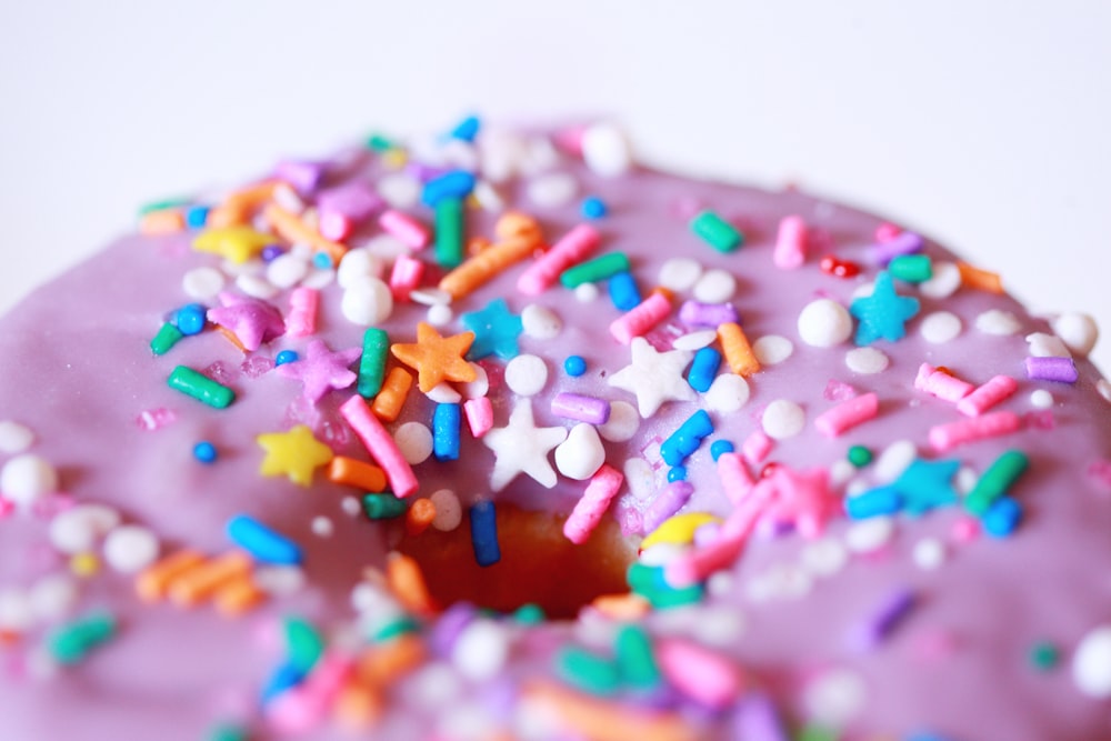 pink and white ice cream with sprinkles