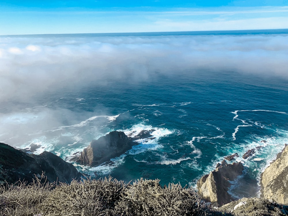 a view of the ocean from the top of a mountain