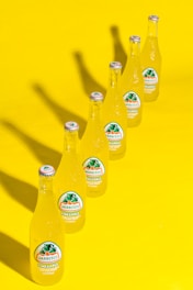 Colorful Mexican beverages arranged in glass bottles