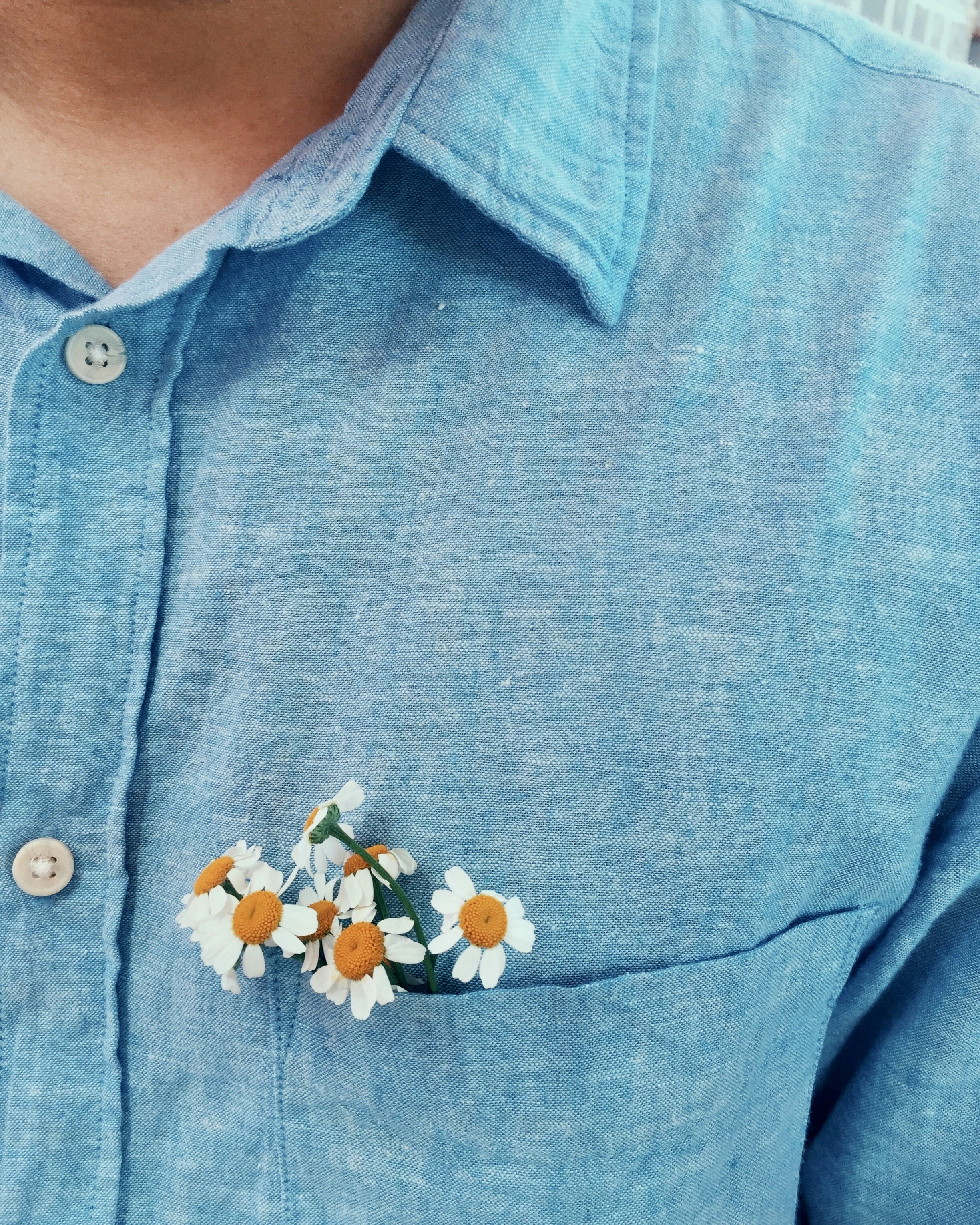 man in blue button up shirt