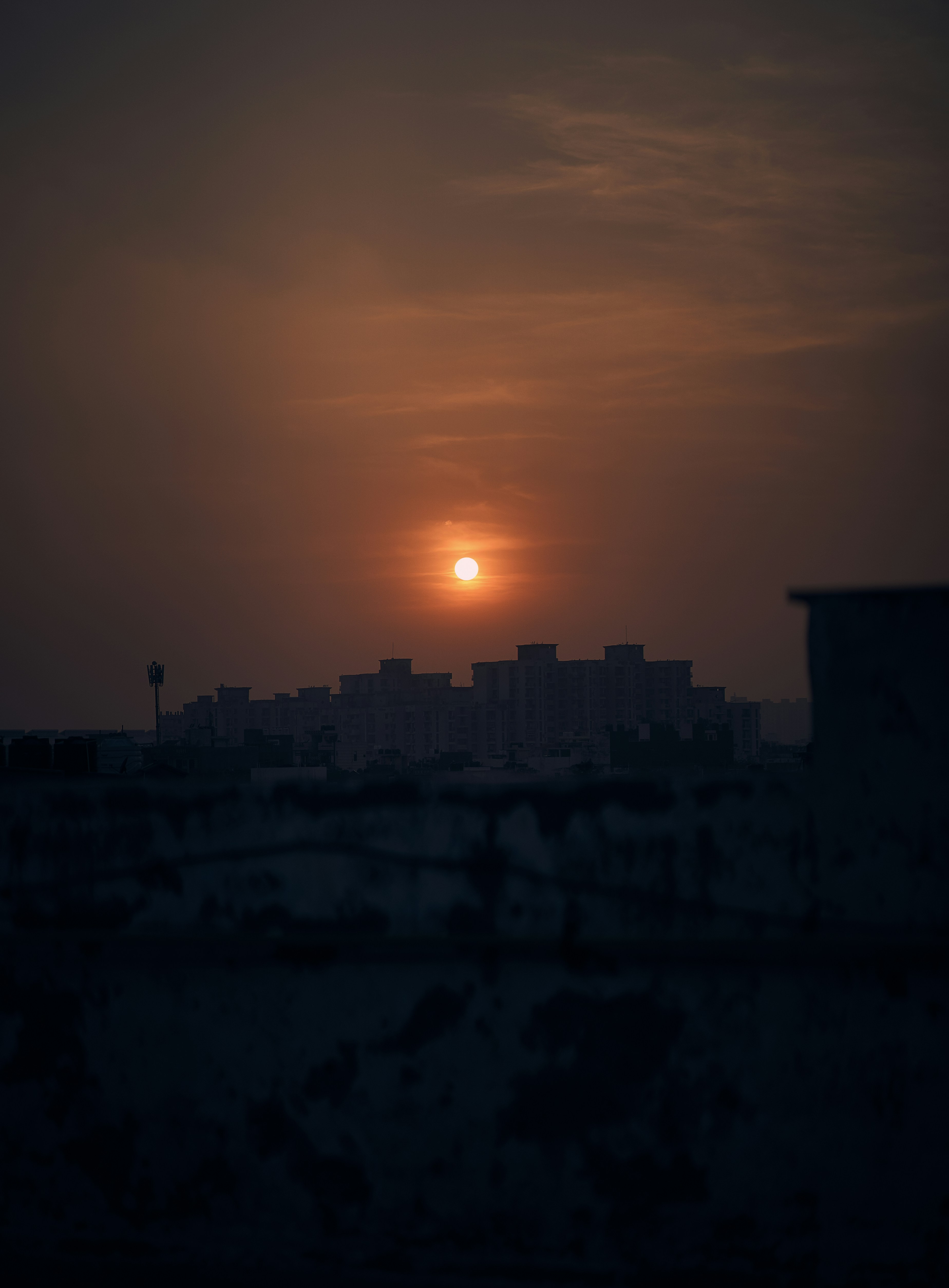 silhouette of building during sunset
