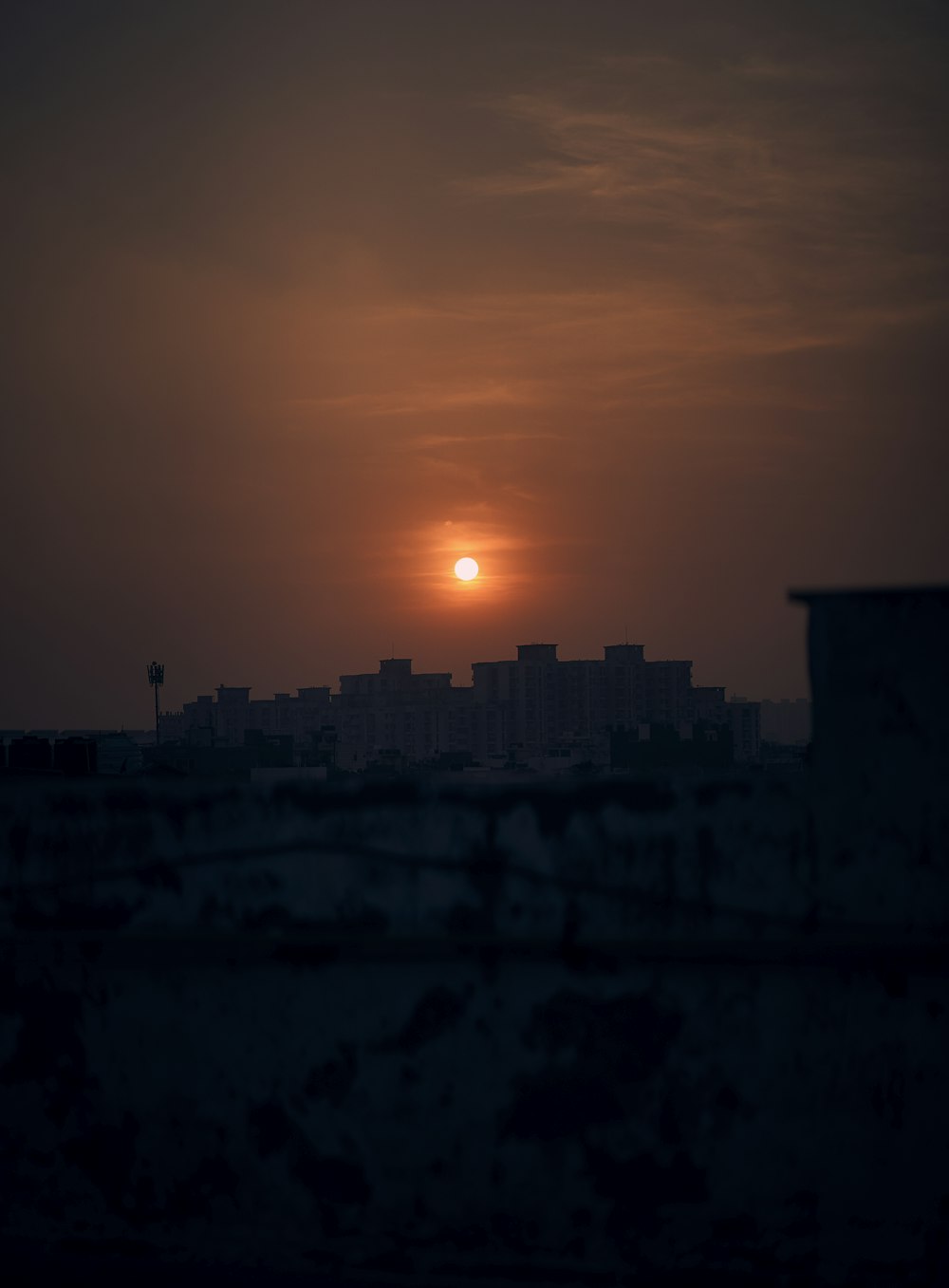 silhouette of building during sunset