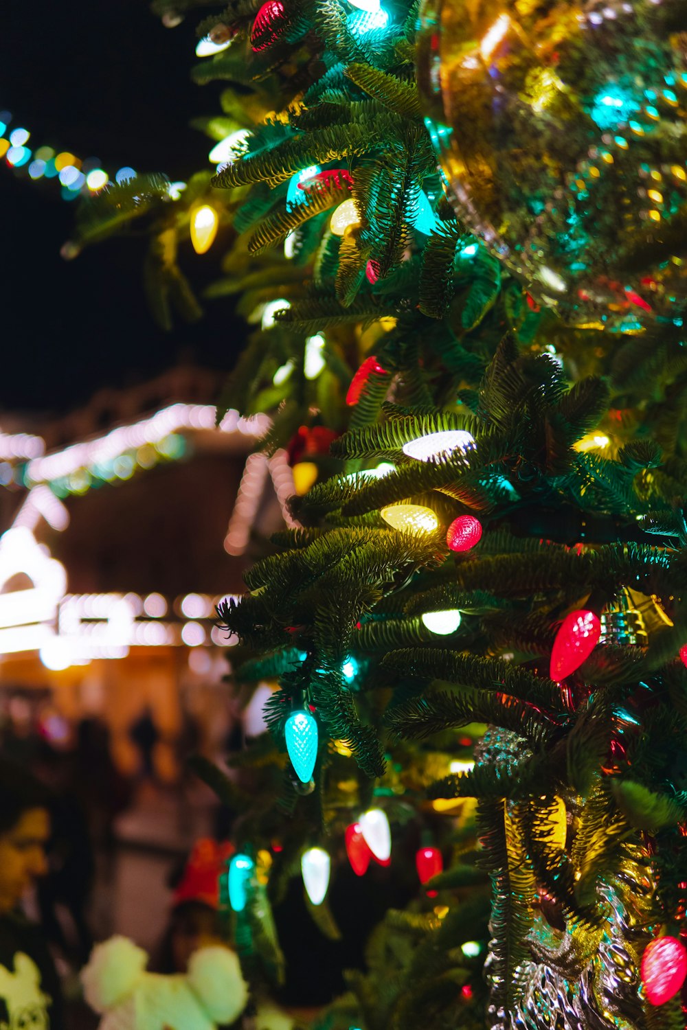 green christmas tree with string lights