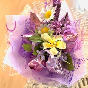 Elegant bouquet of mixed artificial flowers including lilies and tulips