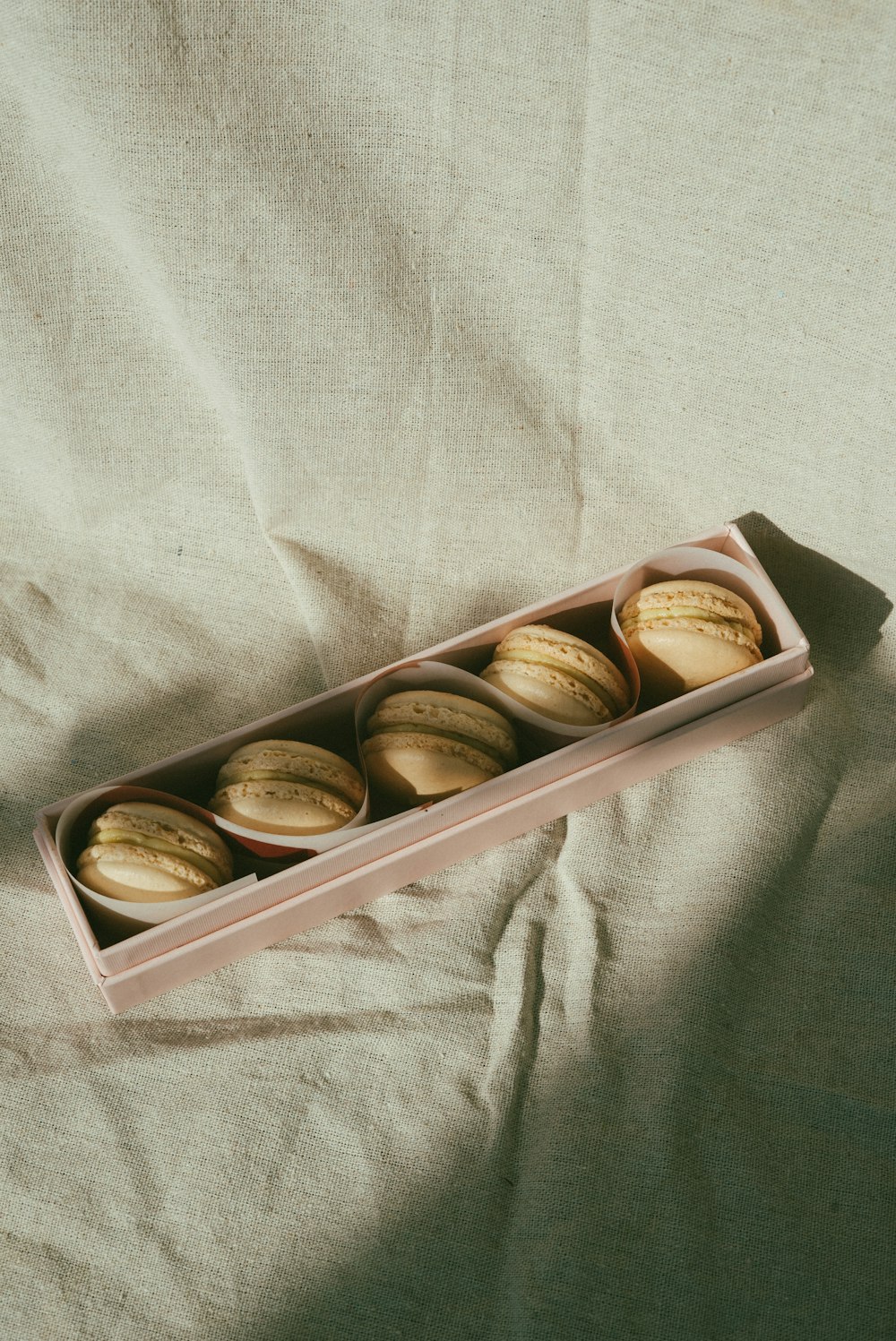 brown and white round chocolate on box