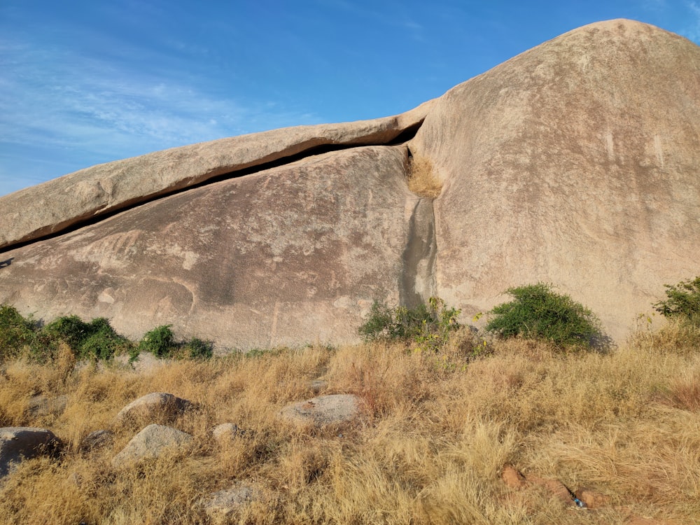 brown rock formation under blue sky during daytime