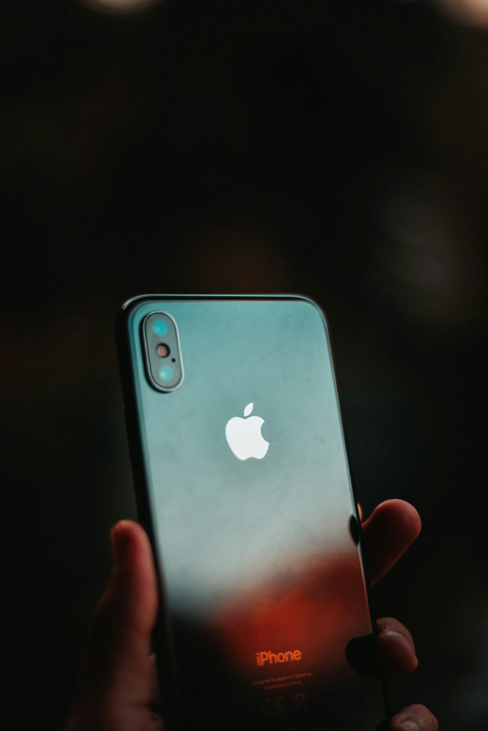 person holding silver iphone 6